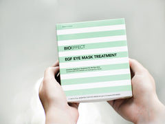 Person holding BIOEFFECT EGF Eye Mask Treatment box set