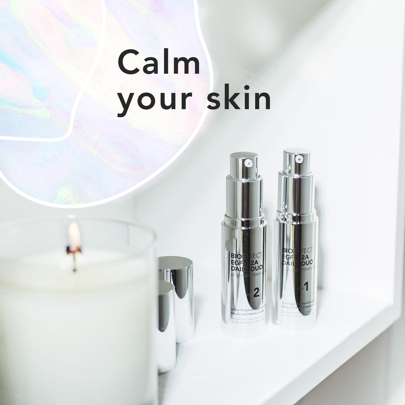 BIOEFFECT Antioxidant Serum skincare products and a white candle with the text “Calm your skin”